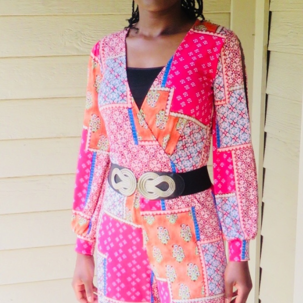 BRAND NEW jumpsuit with elastic and waist tie.